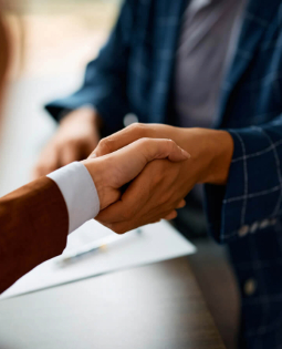 two people shaking hands