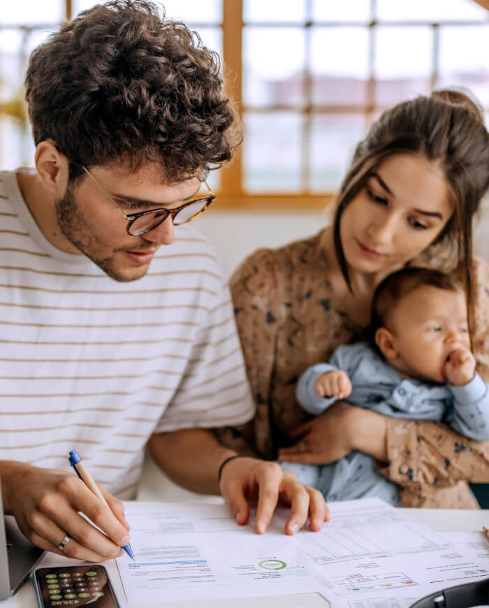 family looking at paper